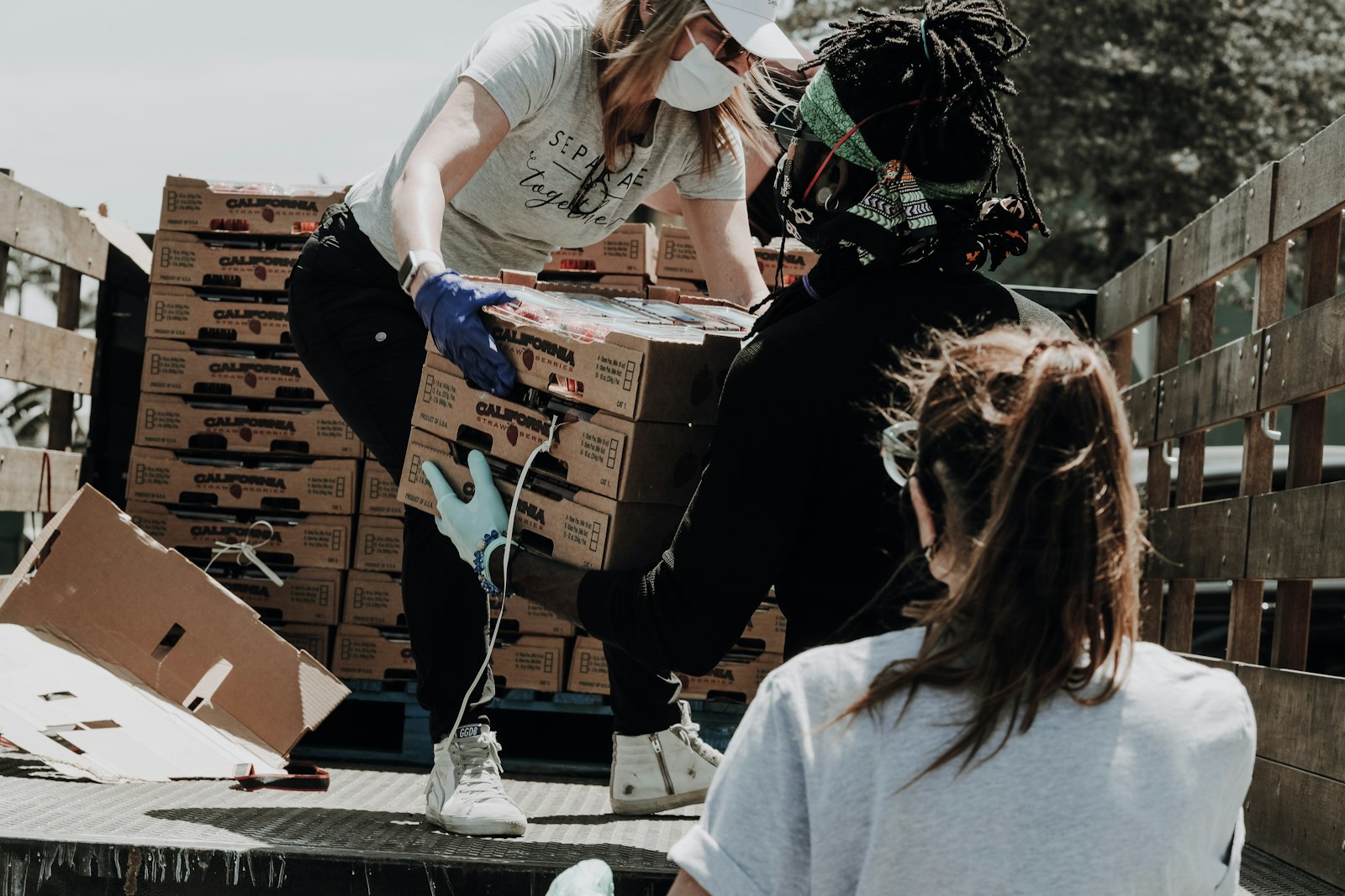 Volunteers packing food donations for families